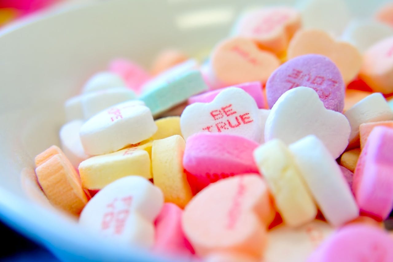 Crafting Captivating Headlines: Your awesome post title goes here A close-up of colorful heart-shaped candies with romantic messages, ideal for Valentine's Day.